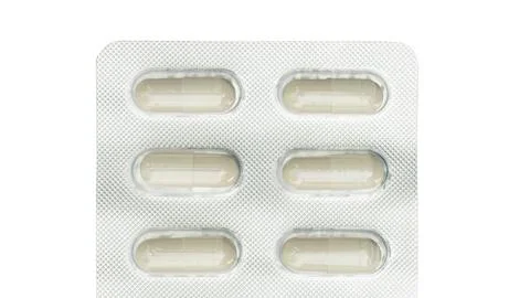 Capsule pill on a white background. Stock Photos