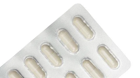 Capsule pill on a white background. Stock Photos