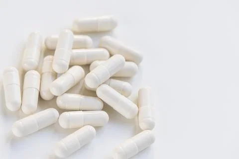 Capsule pill on white background, supplement concept Foto stock