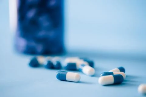 Capsule tablets are scattered Stock Photos
