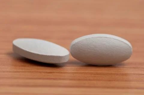 Capsules and pills Stock Photos