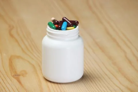 Capsules bottle Stock Photos