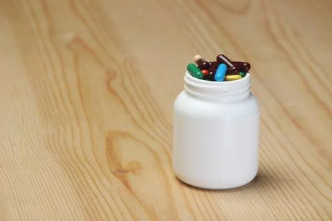 Capsules bottle Stock Photos