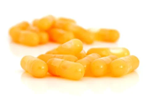 Capsules with cod-liver oil Stock Photos