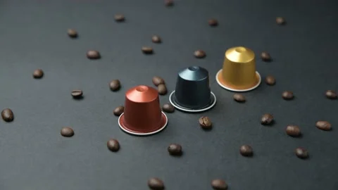Capsules coffee on black background Stock Footage 166602181