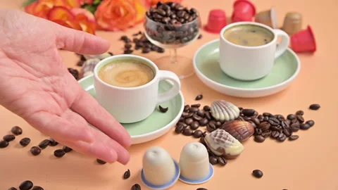 Capsules for an espresso machine in hand. Aromatic Italian coffee with beautiful Stock Footage 148724586