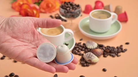Capsules for an espresso machine in hand. Stock Footage 148724755