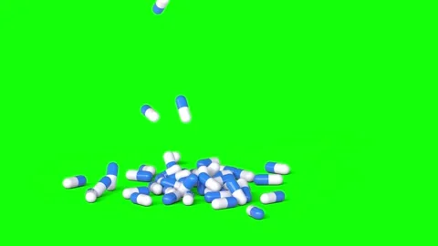Capsules falling  green screen 3d Stockbeeldmateriaal 331800624