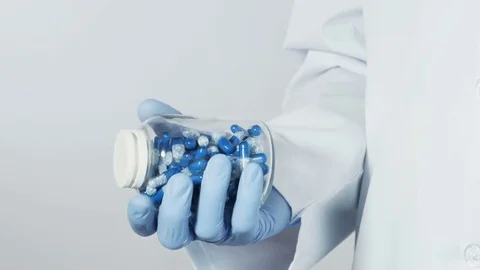 Capsules in hands of doctor 動画素材 70748444
