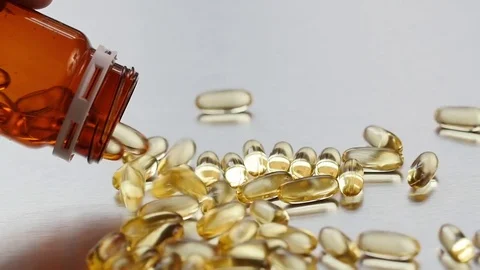 Capsules in a jar Video stock 72372158