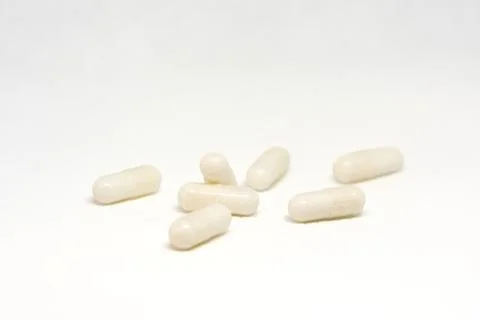 Capsules of Selenium isolated on white background Stock Illustration