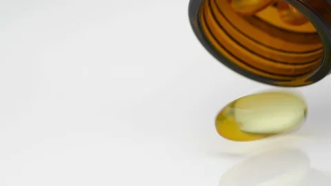 Capsules of a vitamins Stock Footage 129944635