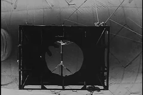 Capt. Brown and Ms. Williams jump from balloon during parachute training - 1943 Stock Footage 105750644