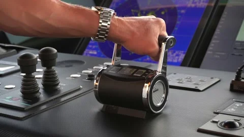 Captain adjusts engine controls on modern yacht bridge. Stock Footage 332418216