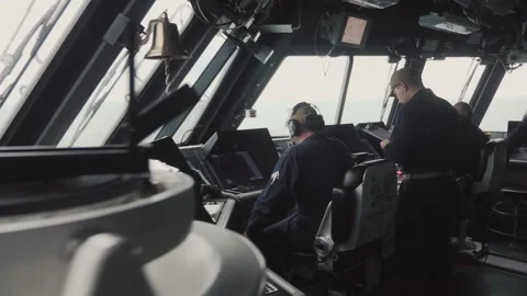 Captain and crew on navy ship bridge Stock Footage 137101371