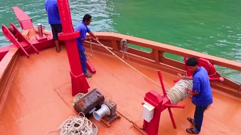 Captain and worker boat James Bond Island Phang Nga Thailand. Stock Footage 317437761
