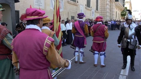 Captain barks instructions to militia outside Grand Master's Palace Stock Footage 82108179