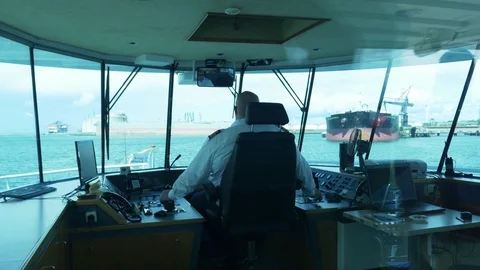 Captain in the cabin of a ferry Stock Footage 70515469