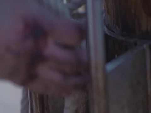 Captain on deck of large ship raises sails. Sailor at the helm of a sailboat Stock Footage 70205358