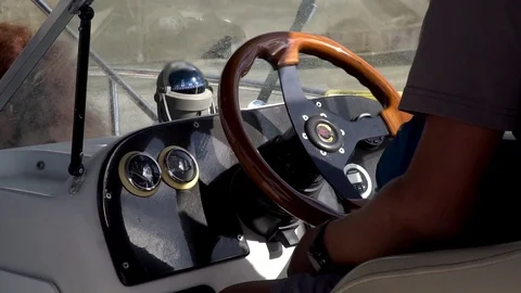 The captain drives the boat Stock Footage 98094501