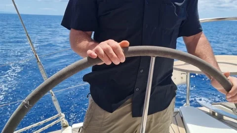 Captain driving a boat in Greece. Stock Footage 219939024
