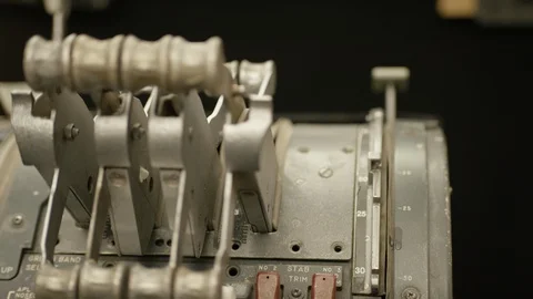 Captain hand accelerating on the flap lever in commercial airliner flight Stock Footage 99984820