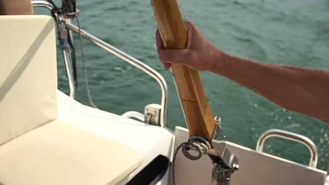 The captain holds the helm of the ship Vídeo Stock 139384534