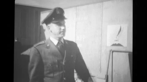 Captain James Westermier talking and pointing during the visitors tour Stock Footage 37596296