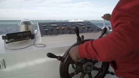 Captain operate an ancient ship steering wheel. Close up Stock Footage 84066905
