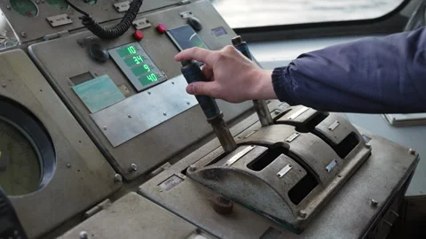 Captain operating levers on ships bridge... | Stock Video | Pond5