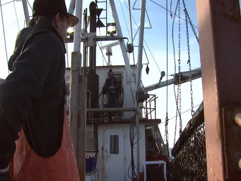 CAPTAIN OF SCALLOPER OPERATING DREDGE Stock Footage 76584591