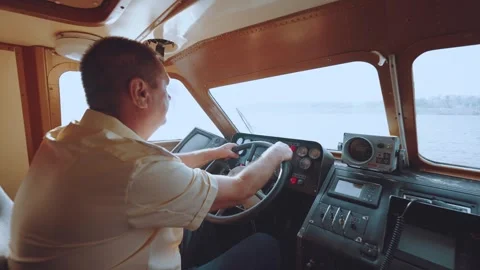 The captain of the ship, the captain controls the ship Stock Footage 249052362