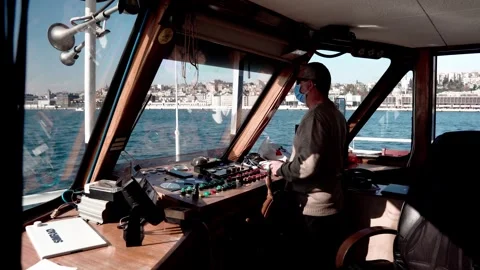 The captain of the ship controls the yacht Stock Footage 281643517