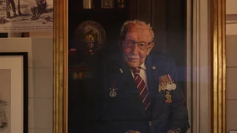 Captain Sir Tom Moore portrait goes on display Stock Footage 148560086