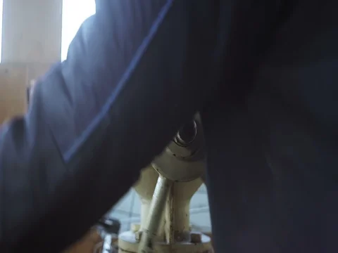 Captain at a steering wheel of the ship Stock Footage 71873511