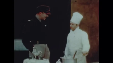 Captain talking to angry chef in the kitchen - 1943 Vidéo 103588739