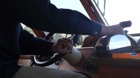 The captain turns the steering wheel. Stock Footage 157776852