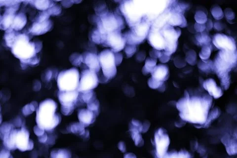 Captivating Abstract of Delicate Violet Light Bubbles against a Deep Black .. Stock Photos