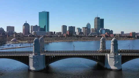 A captivating aerial motion shot of an iconic boston bridge with train cros.. Stock Footage 337778389