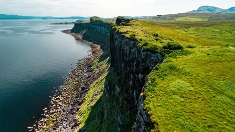 Captivating aerial view of rugged cliffs and coastline in Scotland Stock Footage 314000895