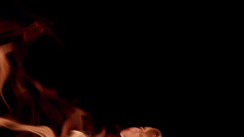 Captivating and Enchanting Flames Dancing Gracefully in the Darkness of the Nigh Stock Footage 310571735