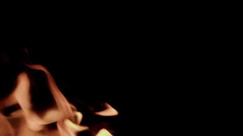 Captivating and Enchanting Flames Dancing Gracefully in the Darkness of the Nigh Stock Photos