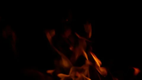 Captivating and mesmerizing Flames dance vibrantly against a Dark Background, cr Stock Footage 311814371