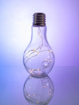 A captivating array of radiant glassware items, illuminated by a soft backlig Foto stock