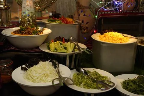 A captivating array of vibrant salad options at iftar buffet in Muscat. Stock Photos