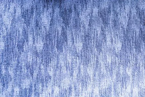 Captivating blue fabric texture showcasing intricate patterns and soft hues.. Stock Photos