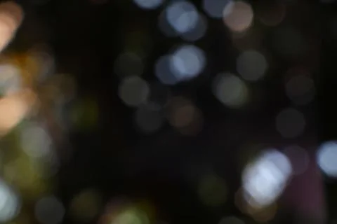 Captivating Bokeh Symphony Unleashed A Melodic Composition Of Blurry Circle.. Stock Photos