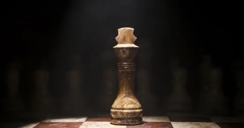 Captivating Chess Piece in Dramatic Lighting and Strong Shadows Stock Footage 338141695