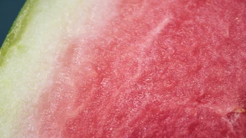 Captivating close-ups showcase its vibrant red flesh, glistening with juiciness Stock Footage 280826219