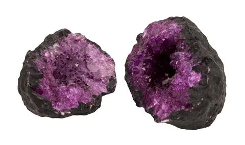 Captivating close-up view of vibrant geode, isolated on white background. Dee Stock Photos